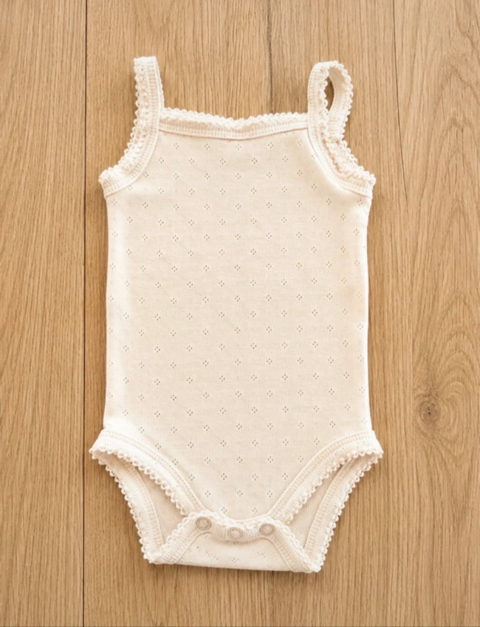Beige romper zonder mouwen 